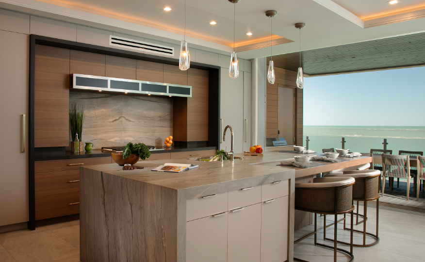 Custom kitchen cabinets Sarasota — Siesta Key Masterpiece featuring slab doors in Rift Sawn Walnut and La Paloma Gray with Gulf views by EuroTech Cabinetry