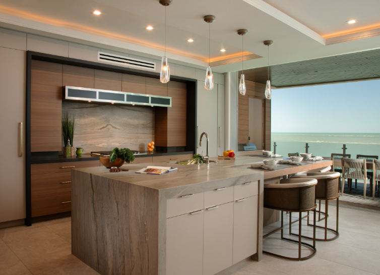 Custom kitchen cabinets Sarasota — Siesta Key Masterpiece featuring slab doors in Rift Sawn Walnut and La Paloma Gray with Gulf views by EuroTech Cabinetry